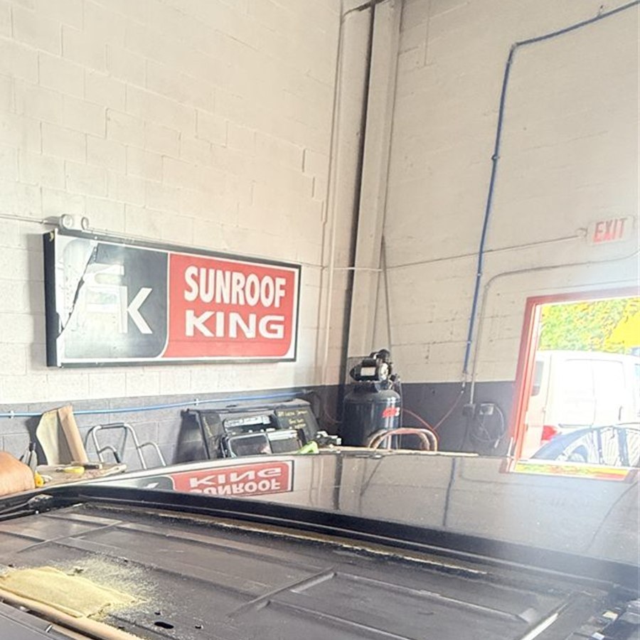 Sunroof opening with the glass removed at the Sunroof King shop in Houston