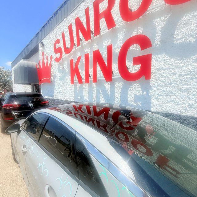 Sunroof King shop wall signage in Houston